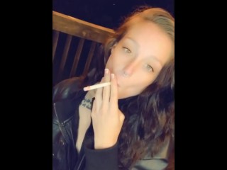 Consandra Sandlin smoking in leather jacket