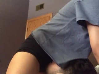 Cutie in booty shorts facesits him and gives him a handjob