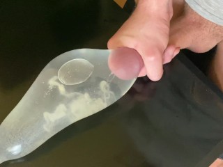 Horny Guy Moaning while Fucking his Own Hand and Cum alot inside Condom filled with Water – 4K