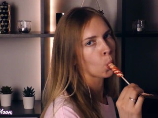 Beautiful girl sucking lollipop