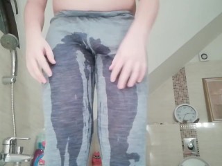 Young chubby boy pee his leggins. Peeing pissing