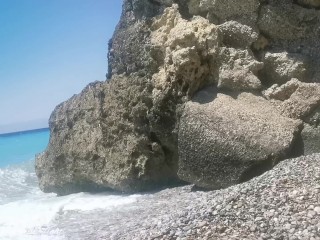 Oiling my big titties on the beach