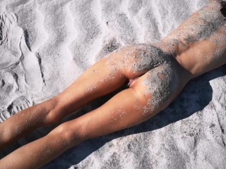 Stranger finds a perfect tanned skinny brunette on a nudist beach and gives her a hot piss