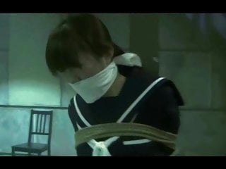 Japanese Schoolgirl tied and gagged in warehouse