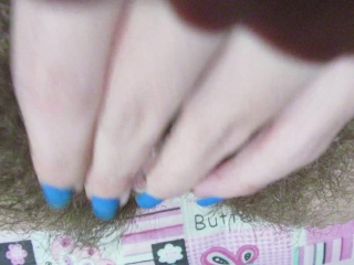 Rubbing my huge clitoris . Hairy pussy close up