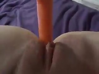 Horny sexy lady fucking with carrot