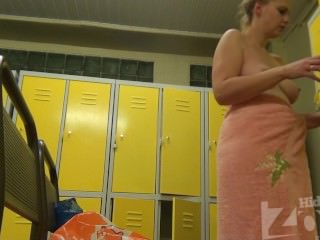 Women change clothes in the locker room 1304
