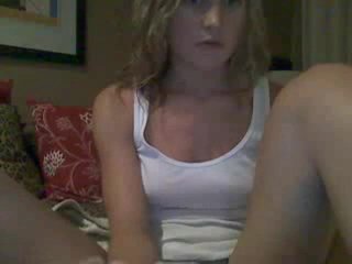 College hottie rubs her shaved pussy daily