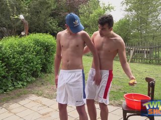 Hung twinks play wet outdoors
