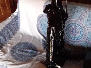 Laura on Heels amateur 2021 on a sofa wearing black sexy platform boots over the knees