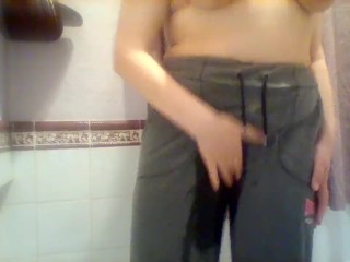 Wetting grey sweatpants and rubbing pussy