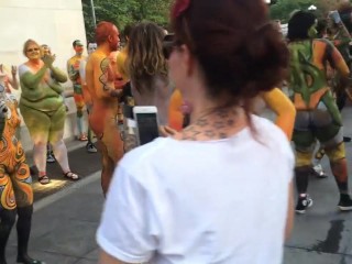 Bodypainted people dancing nude in public