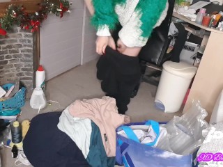 Smoking and pee desperation peeing on a pile of clothes on the floor in bedroom