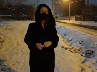 Risky night walk on the snowy street (People nearby)