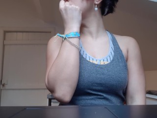 flexing her biceps and triceps while working