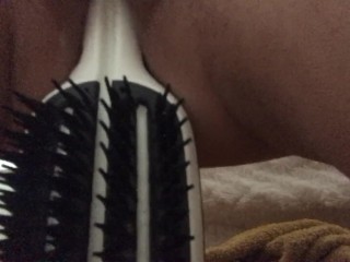 Fucked my young pussy with a big hairbrush