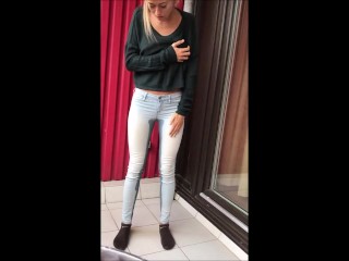 SkinnyBitch99: Jeans Wetting on balcony