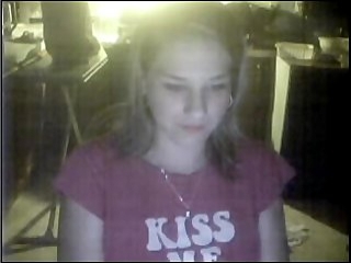Cute blonde chick chatting on webcam